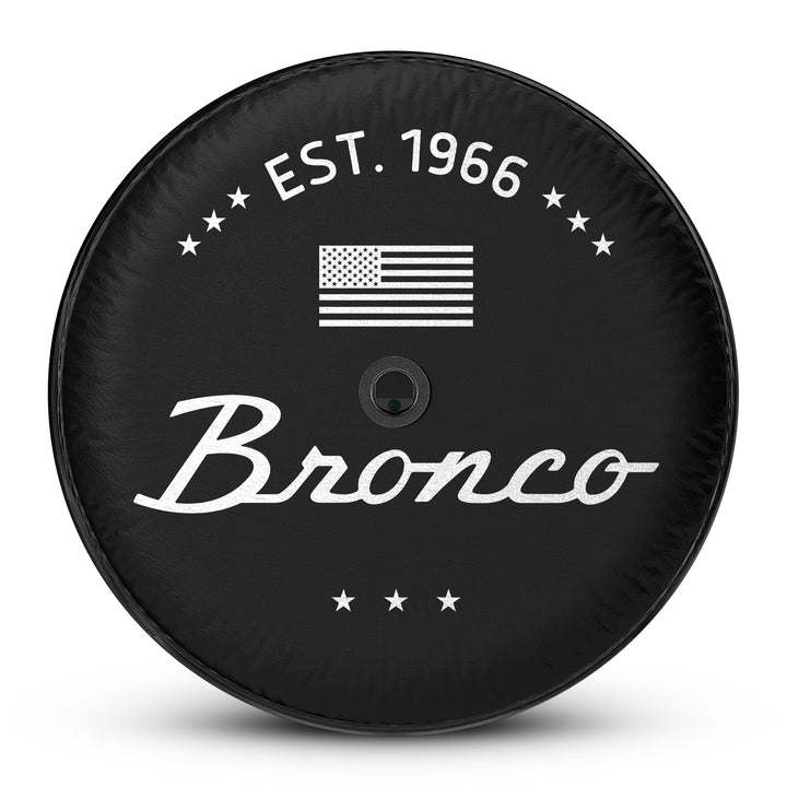 Classic Bronco spare tire cover with a backup camera port