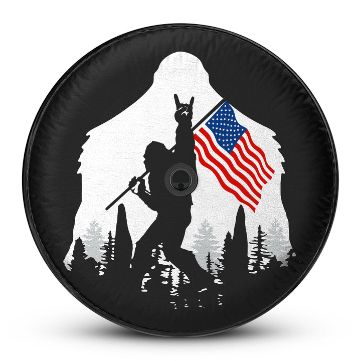 Ford Bronco Patriotic Sasquatch Tire Cover featuring a bold American flag design with a Bigfoot silhouette. Weather-resistant, durable, and custom-fit for Bronco spare tires—perfect for off-road and adventure enthusiasts.