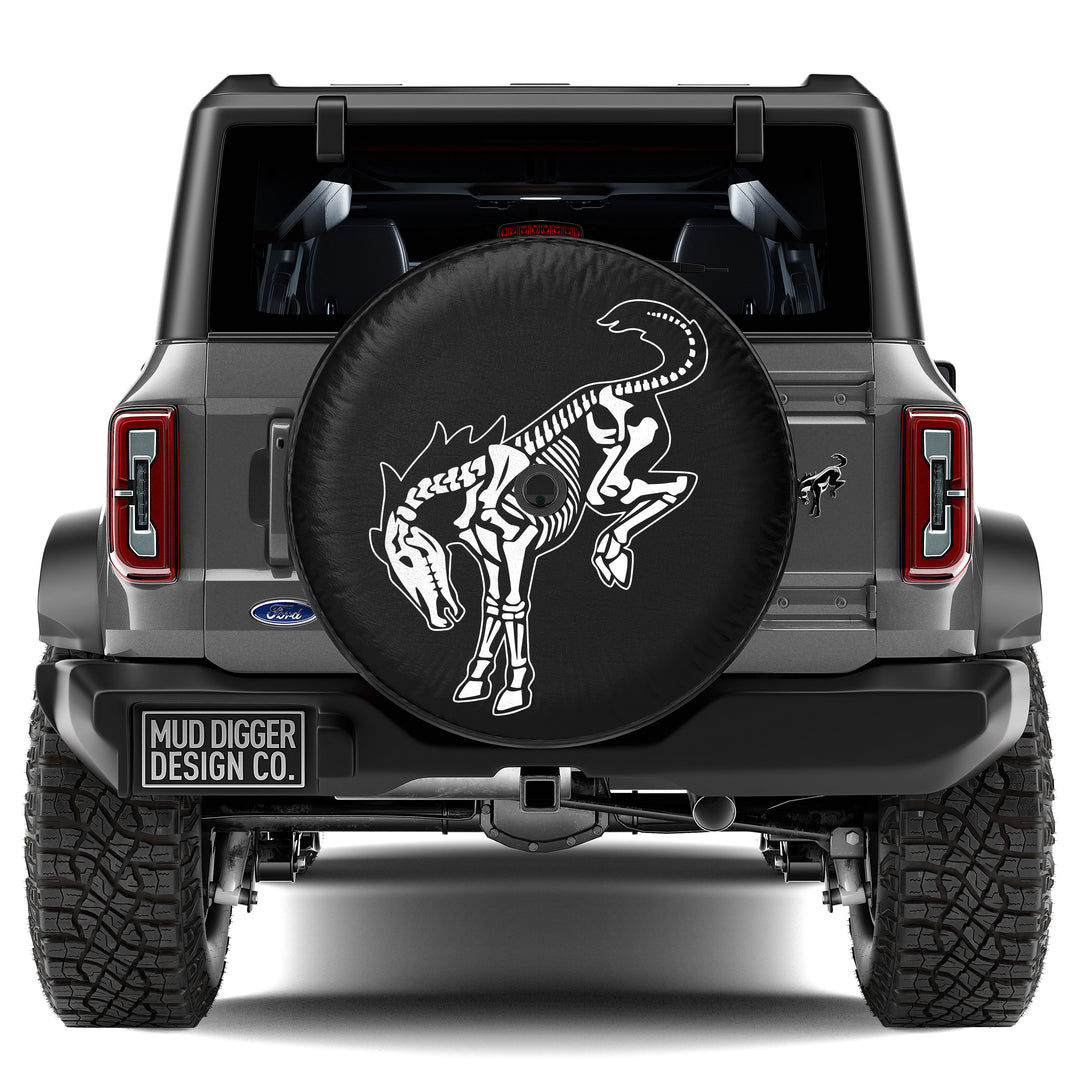 Skeleton Bronco spare tire cover featuring a backup camera port