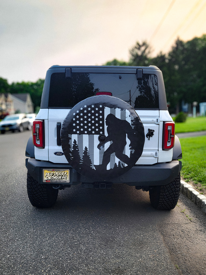 B&W Bigfoot Flag Tire Cover